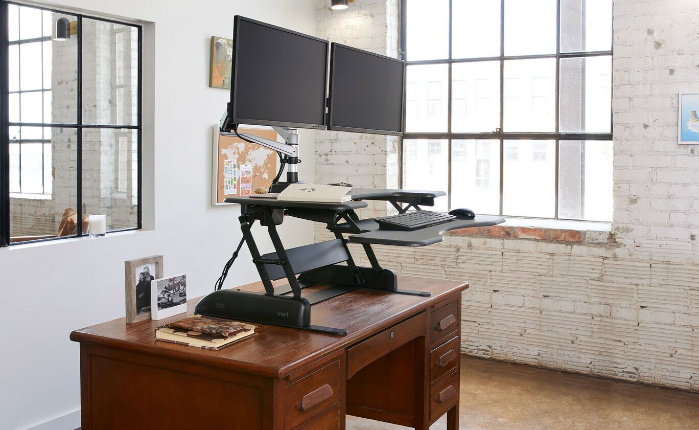 Trabajar de pie con Varidesk